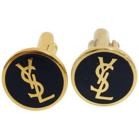 ysl cuff links|YSL charm bracelet.